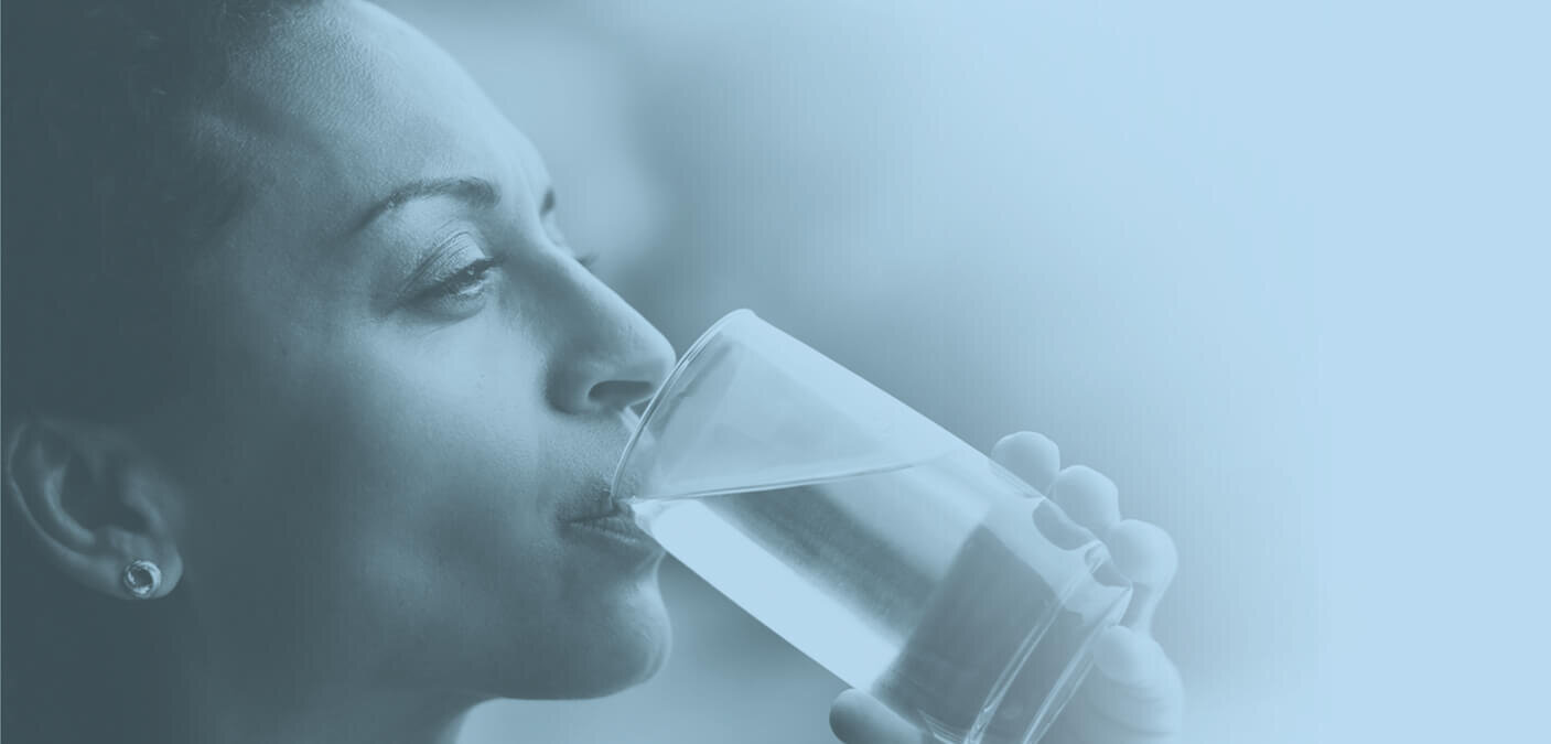 Woman drinking a glass of water